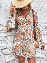 Load image into Gallery viewer, Printed Surplice Neck Flare Sleeve Dress
