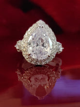 Load image into Gallery viewer, 3 Stone White Sapphire Pear Halo Ring
