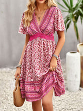 Load image into Gallery viewer, Floral Print Bohemian Style V-Neck Flutter Sleeve Dress
