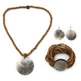 Carved Gray Shell Pendant With Golden Seed Bead Necklace and Matching Bracelet and Earrings