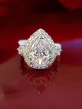 Load image into Gallery viewer, 3 Stone White Sapphire Pear Halo Ring
