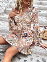 Load image into Gallery viewer, Printed Surplice Neck Flare Sleeve Dress
