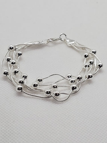 Silver Entwined Bead Floating Bracelet Invisible