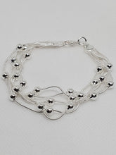 Load image into Gallery viewer, Silver Entwined Bead Floating Bracelet Invisible
